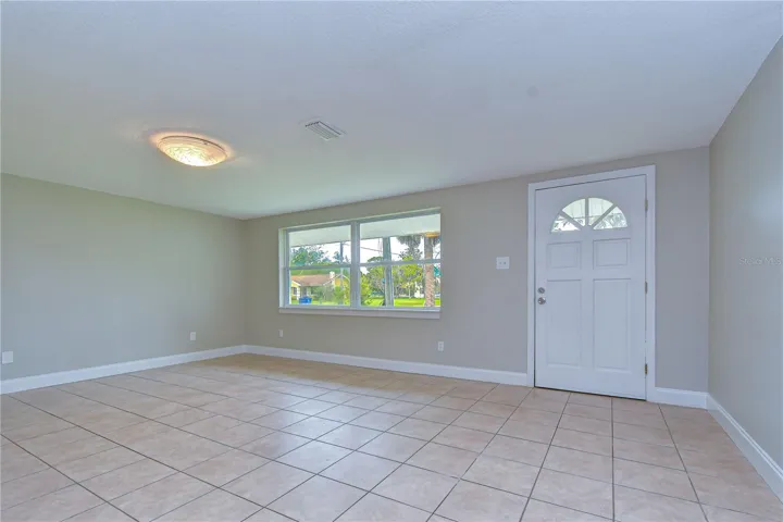 Bright and welcoming main living space filled with natural light.