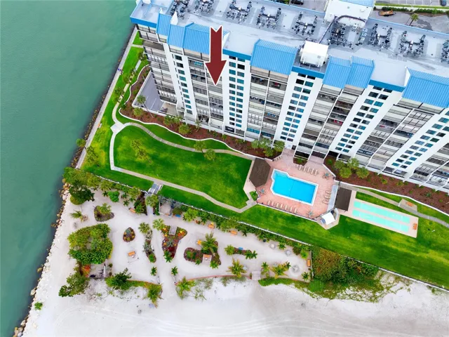 7100 Sunset Way #810 - The manicured grounds and garden, pool, shuffleboard and beach