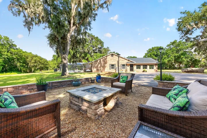 Relax and unwind around the outdoor fireplace.