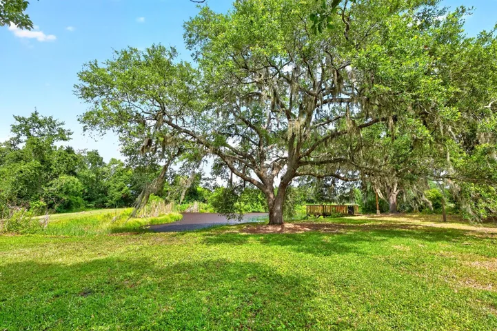 A private peaceful escape to your private dock on your 3/4 acre pond.