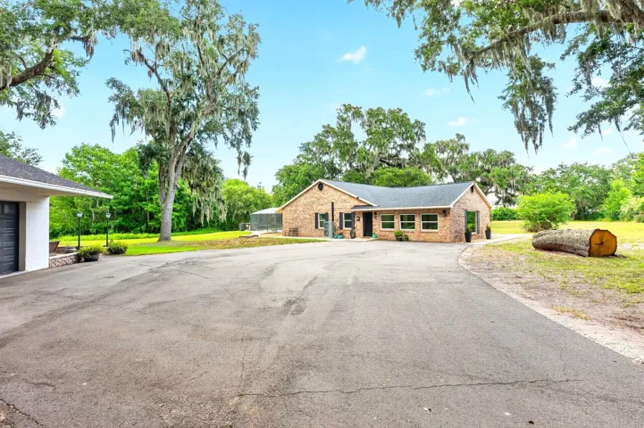 Ample parking between the detached garage and the main home.