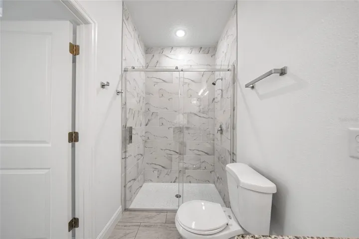 MASTER BATH WITH GLASS DOOR SHOWER