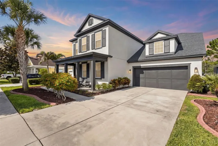 Rare Ashton Woods Ferrara floor plan in Asturia with pond views, fenced backyard, and 2,890 sq ft of thoughtfully designed living space