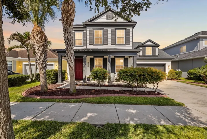 Rare Ashton Woods Ferrara floor plan in Asturia with pond views, fenced backyard, and 2,890 sq ft of thoughtfully designed living space