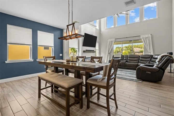 Dining area positioned between the kitchen and living room