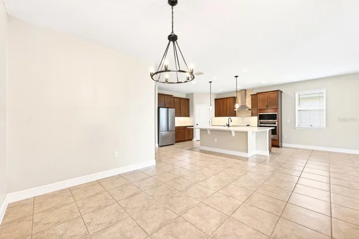 Dining area is open to the living room and kitchen.