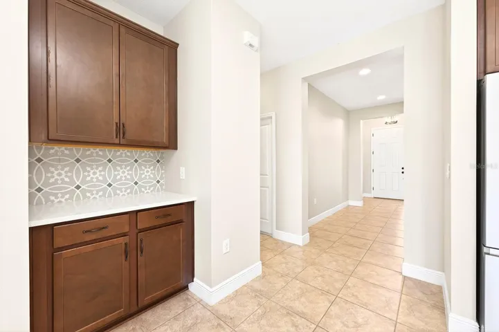 Additional storage off the kitchen/dining area.