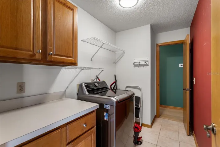 Laundry room by Kitchen