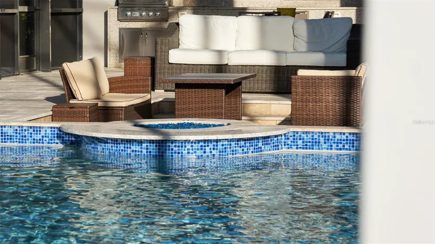 Pool bar with firepit