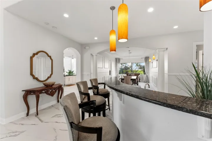 Wet bar looking into dining room