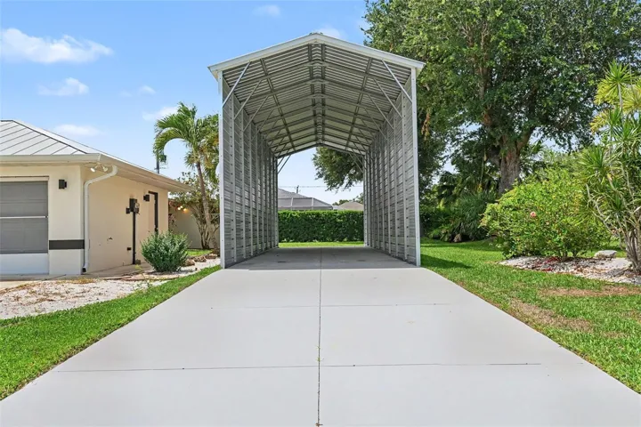 Carolina Carports carport - permitted and can had a backend and a front garage door put on.