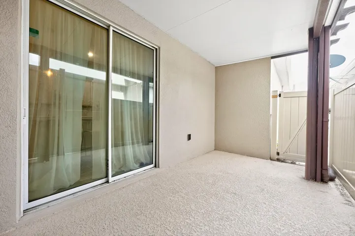 A COVERED REAR PATIO provides the perfect spot to enjoy your morning coffee or unwind at the end of the day.