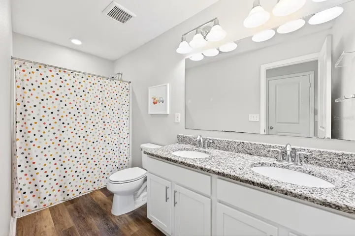 Two additional generously-sized Bedrooms and SECOND FULL BATH provide flexibility for family, guests, a home office, or hobby space.