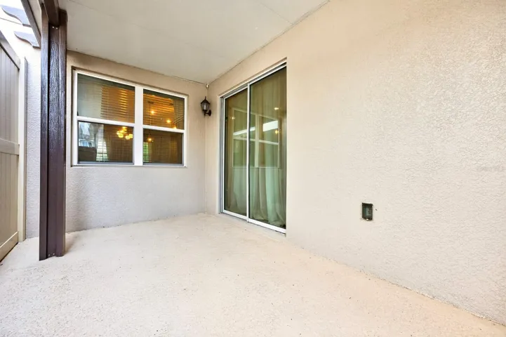 A COVERED REAR PATIO provides the perfect spot to enjoy your morning coffee or unwind at the end of the day.