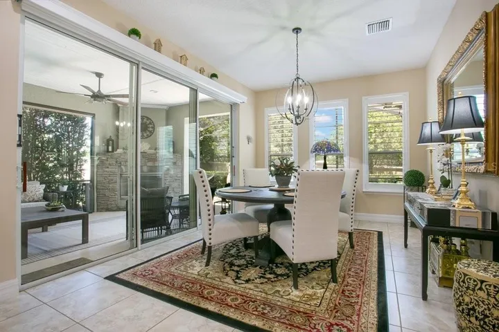 Dining room with sliders opening towards the porch