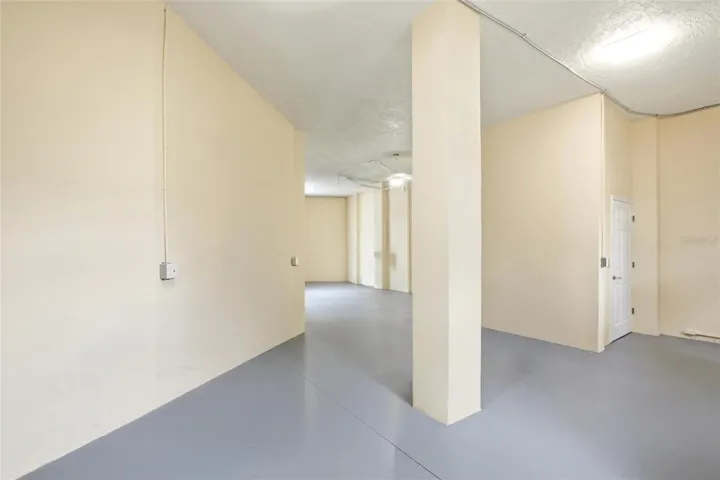 Ground level storage and elevator