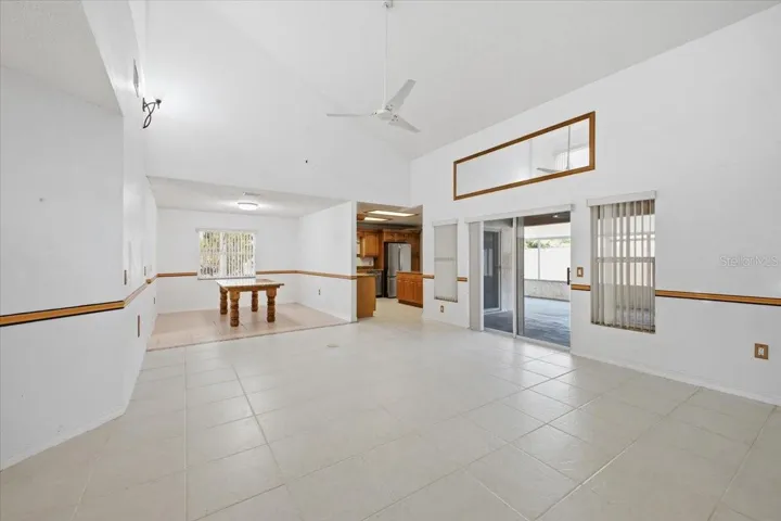 Living room looking to dining room and kitchen