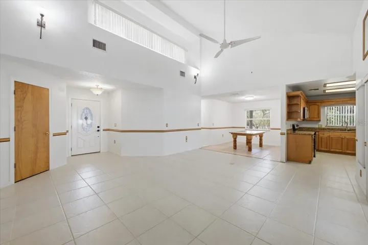Living room looking to dining room and kitchen