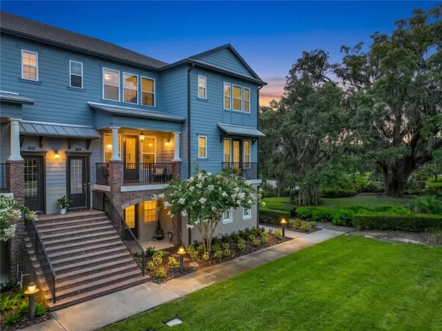 Twilight photo of front of property.