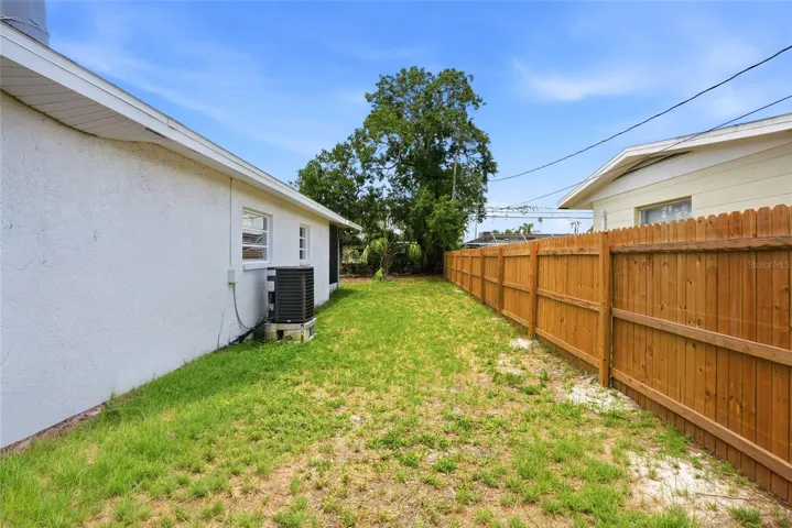 Wide side yard with privacy fence