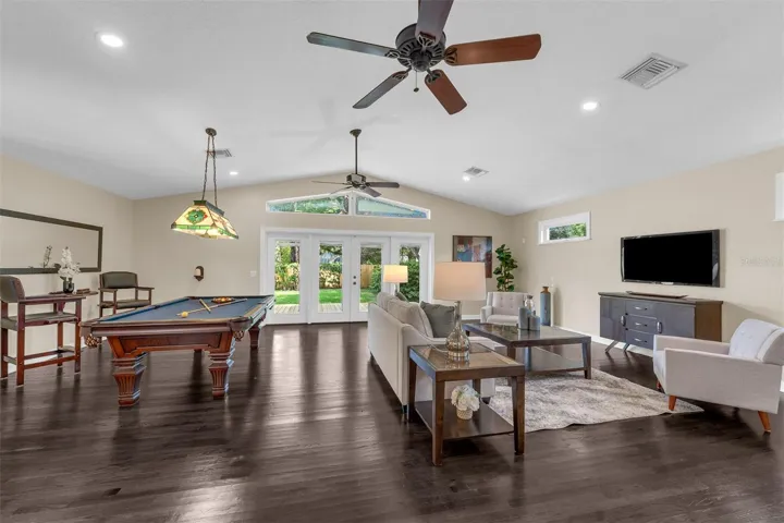 Gorgeous matching hardwood floors flow throughout the house.
