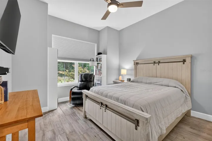 Welcoming guest bedroom with picturesque front yard views