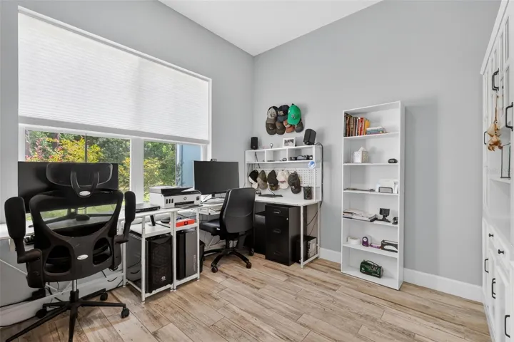 Peaceful office with views of majestic oak trees