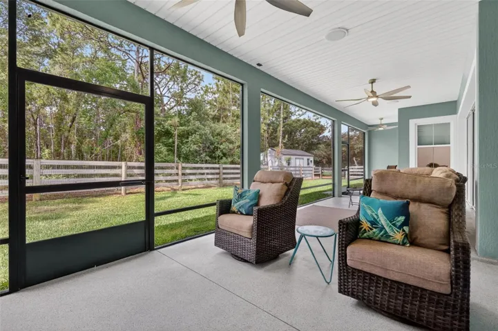 Quiet outdoor living space with wooded views