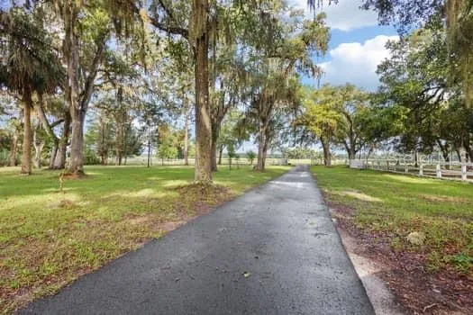 paved driveway with parking apron