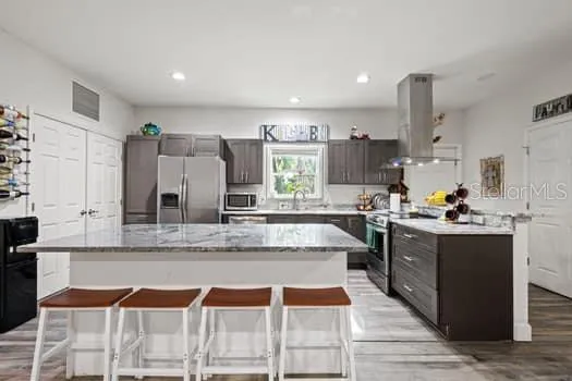 island kitchen with breakfast bar