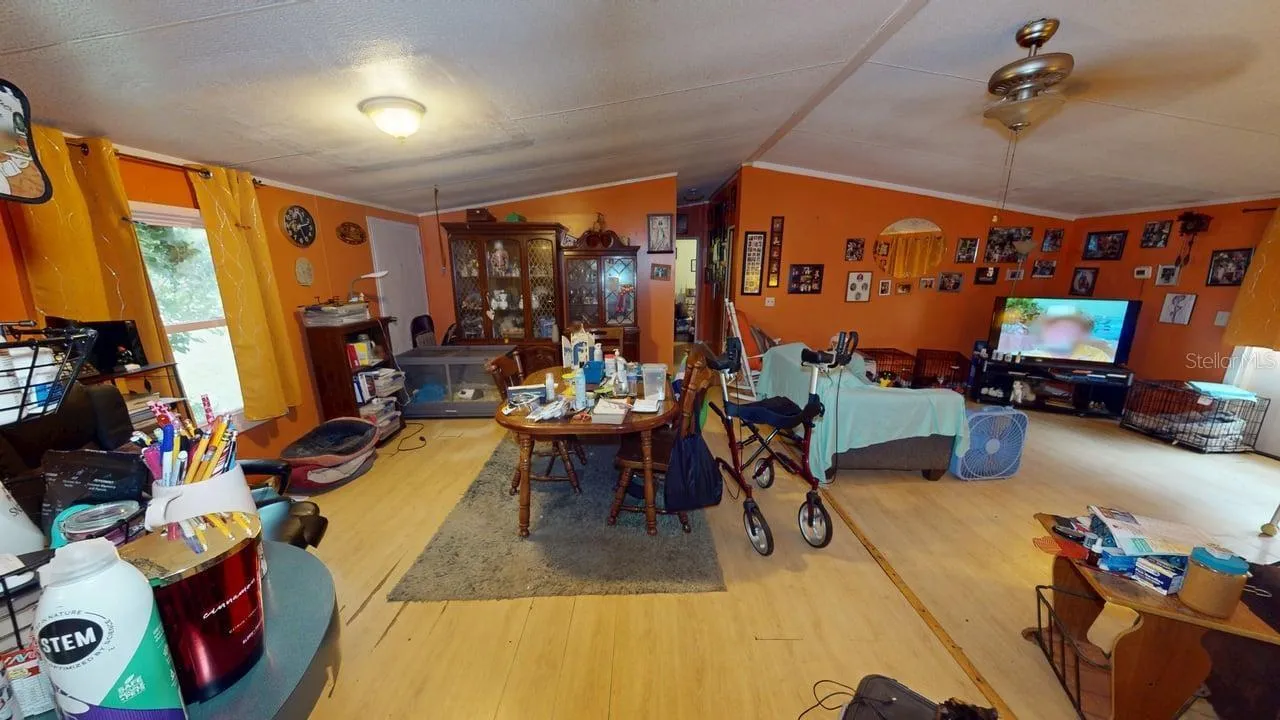 Spacious open living and dining room in home 1