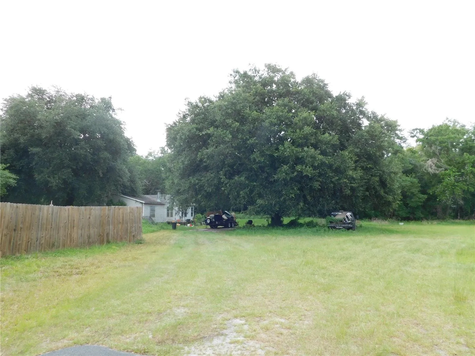 View of side lot and Home 2 in the back