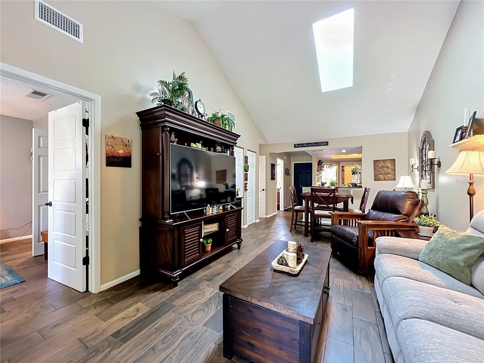 Living Room and Entry to Primary Bedroom