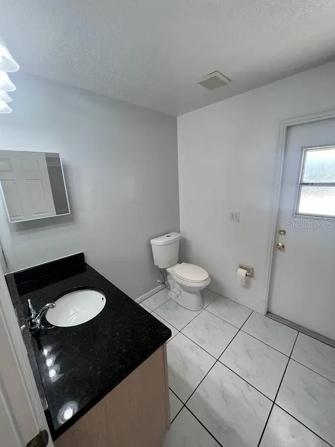 Bath with direct access to pool area