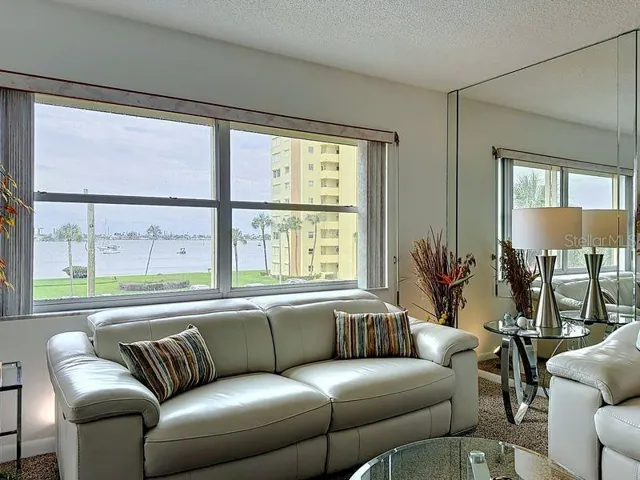 Coastal comfort-Modern furnishings meet tranquil intercoastal views for the perfect blend of style and relaxation.
