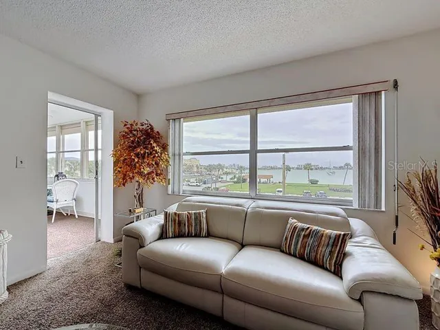 Coastal comfort-Modern furnishings meet tranquil intercoastal views for the perfect blend of style and relaxation.