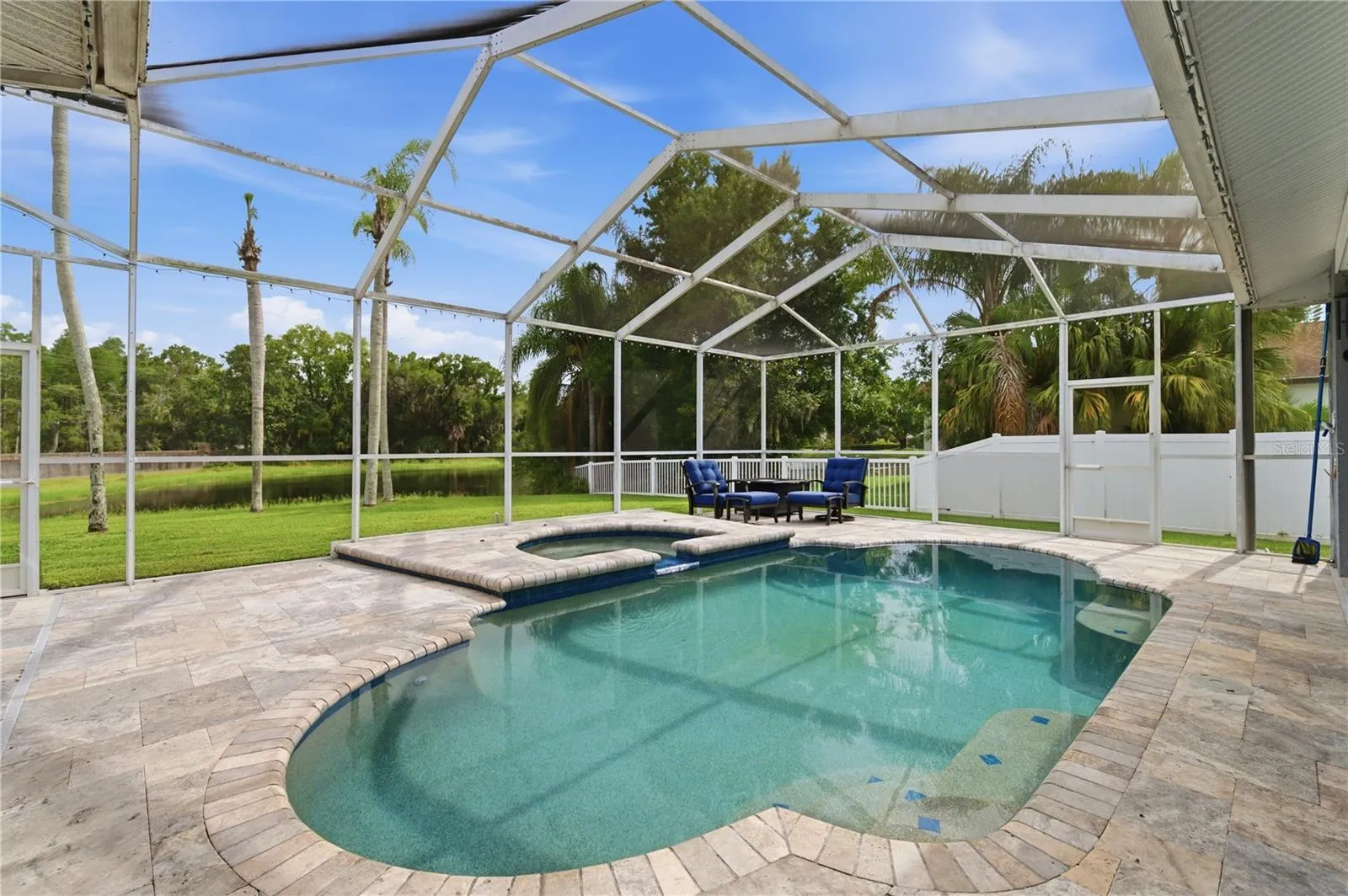 Pool & Spa with views of the spring fed pond