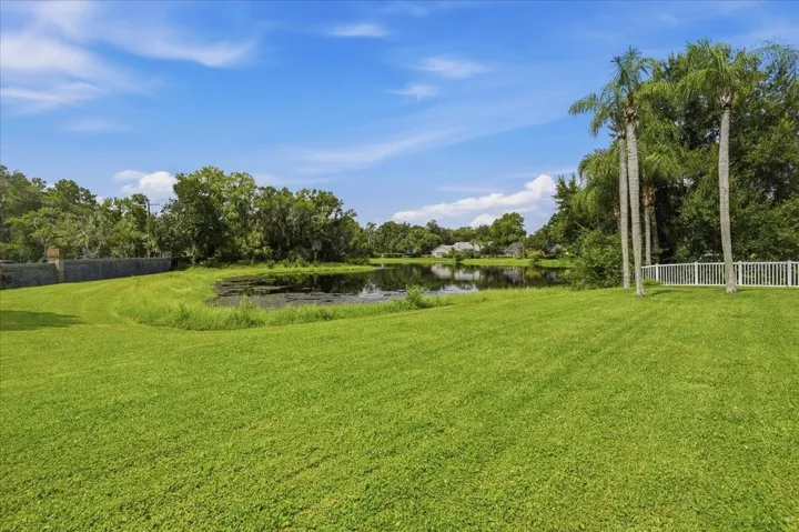 Large backyard with pond.