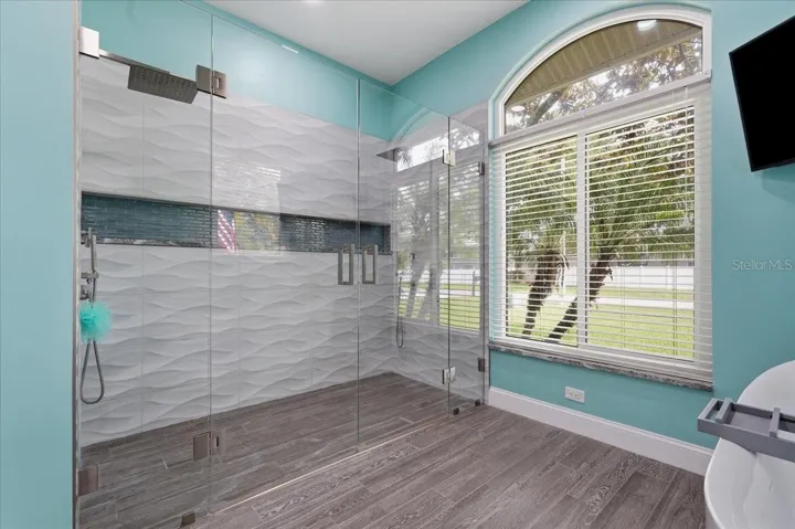 Large double shower with rainfall shower head fixtures