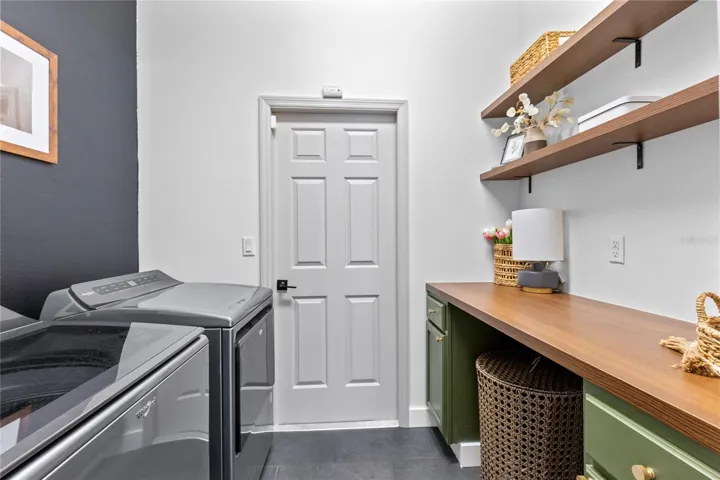 Custom built laundry room looks amazing