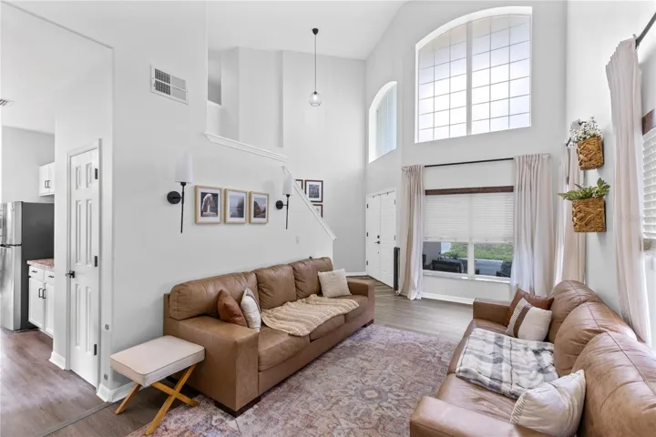 So much natural light in the nearly 20' ceilings
