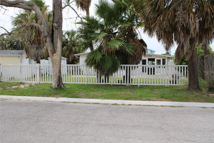 Both front and back of home are open to a street. Loads of room for RV and boat parking.