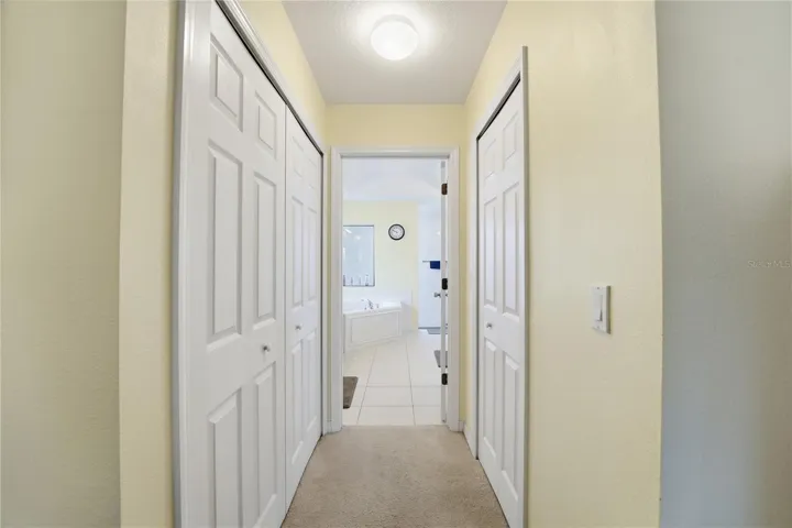 Double Closets Between Primary Bedroom & En-Suite Bath