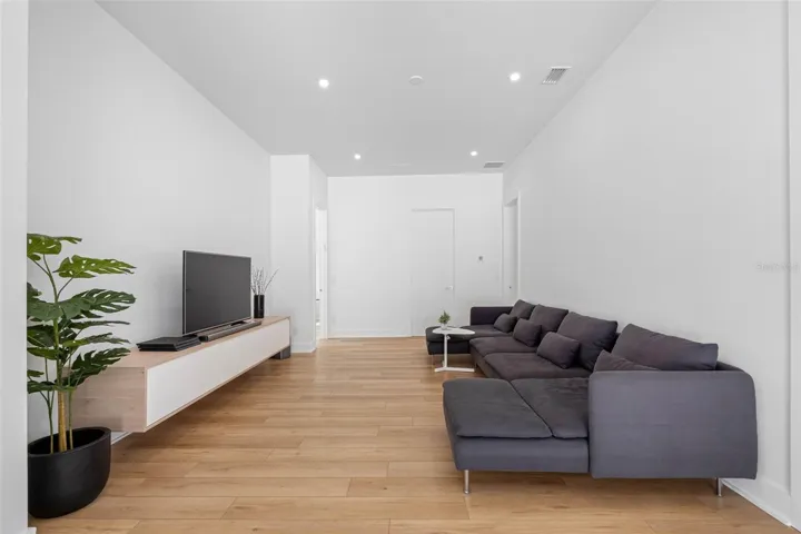 Family on the second floor features built-ins to store media devises and drawers. Dimmable lights.