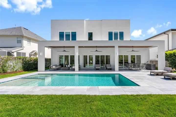 Energy efficient - 2story block home - PGT hurricane resistant windows - flat TPO 60 membrane roof with 5