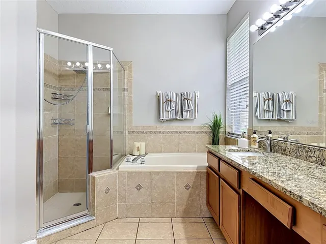 Garden tub and glass enclosed shower
