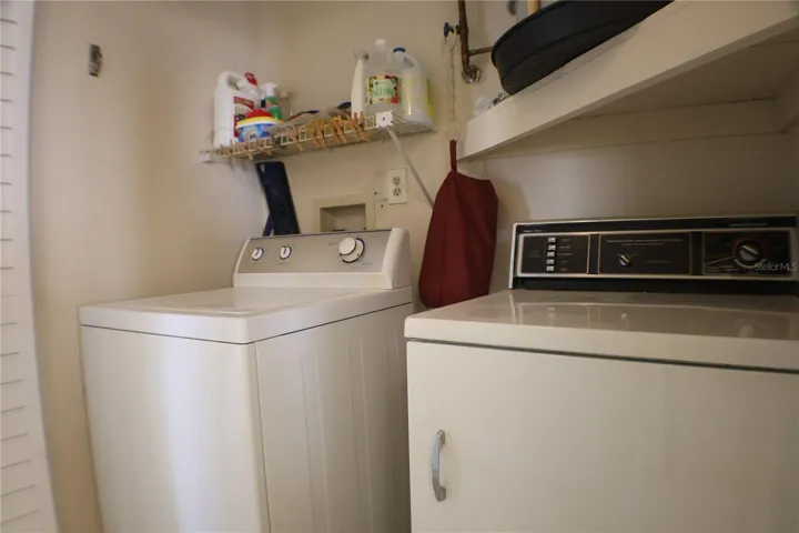 Washer and Dryer off kitchen