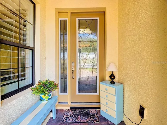 Upgraded front entrance door with leaded glass inlay and side entrance window