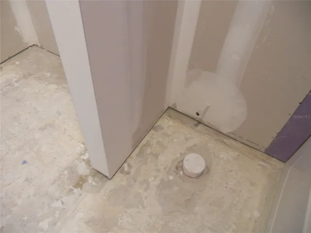 PLUMBING ROUGHED IN FOR COMMODE.