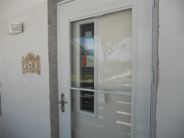 UNIT 240 HAS NEW STORM DOOR AND HURRICANE RATED EXTERIOR DOOR.